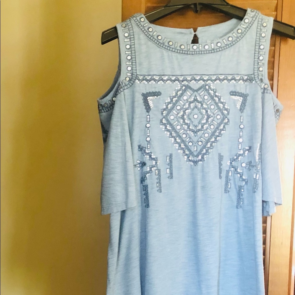 Chico’s top In blue with Beautiful embroidery and cutout shoulders